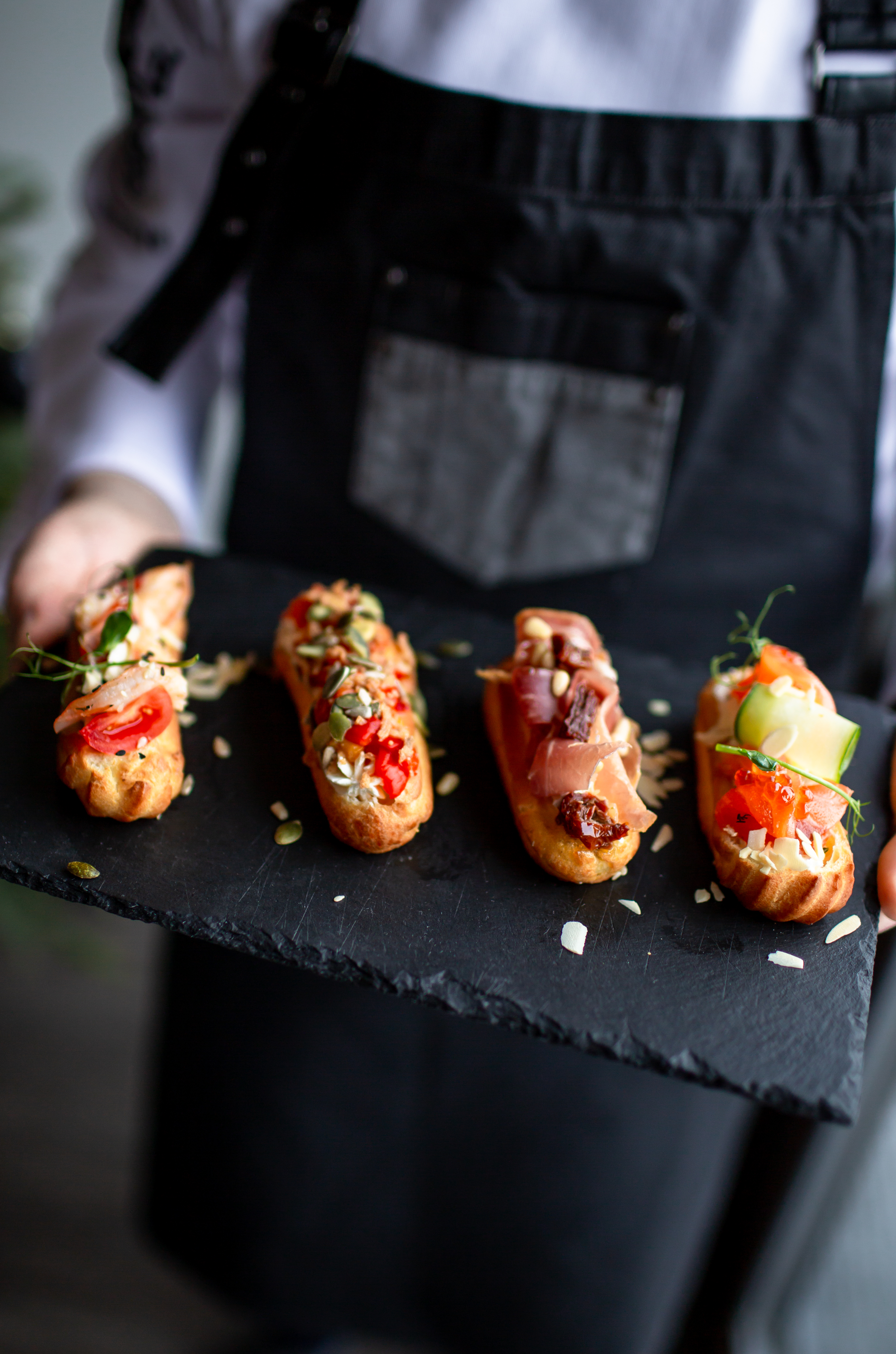 Chef holding a prepared dish